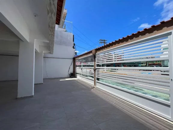 Imagem Casa com 2 dormitórios à venda, 51 m² por R$ 245.000 - Caiçara - Praia Grande/SP