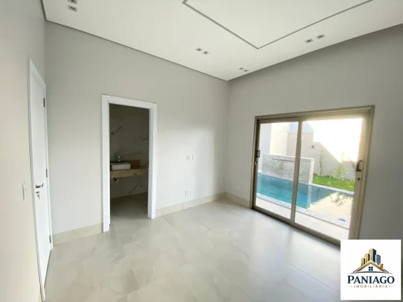 Imagem Casa de alto padrão com 3 suítes, cozinha gourmet e piscina com cascata
