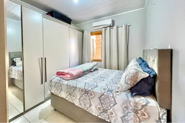 Imagem ODN 155 Apto 610241030-49 - Casa à venda no bairro Olaria - Canoas/RS