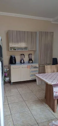 Imagem Casa com 3 dormitórios à venda, 114 m² por R$ 495.000,00 - Maracanã - Praia Grande/SP