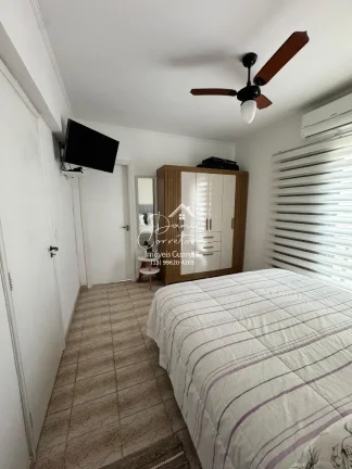 Imagem Imperdível oportunidade de adquirir um apartamento no Guarujá-SP, Jardim Las Palmas: 2 quartos, 1 suíte, 2 salas, 3 banheiros, 1 vaga de garagem e 90m² de área!