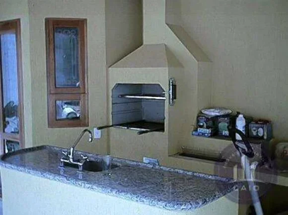 Imagem Casa com 4 dormitórios à venda 352 m² por R$ 2.790.000 - Alphaville/SP