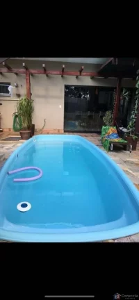 Imagem Casa de Alto Padrão no Bairro Sobradinho em Patos de Minas – 4 Quartos, Suíte com Hidromassagem e Garagem para 4 Carros!
