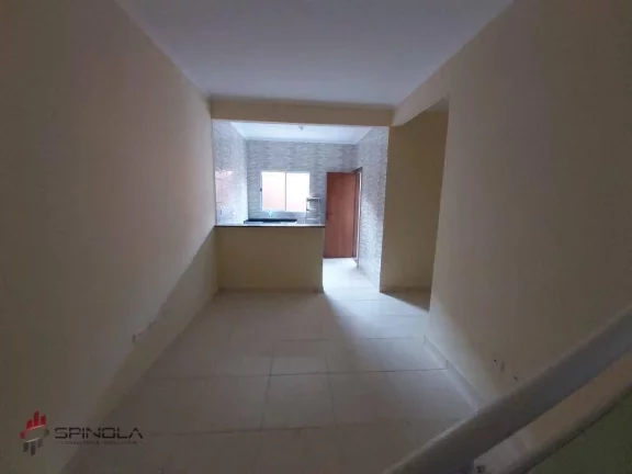 Imagem Sobrado com 2 dormitórios à venda, 52 m² por R$ 295.000,00 - tude basto - Praia Grande/SP