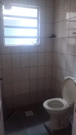 Imagem Casa em Praia Grande, na Vila Tupi, 2 dormitórios e área construída de 93,7 m².