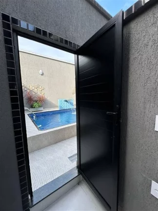 Imagem Casa à Venda em Maracanã, Praia Grande - SP