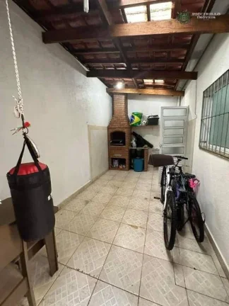 Imagem Sobrado com 3 dormitórios à venda, 125 m² por R$ 650.000 - Caiçara - Praia Grande/SP