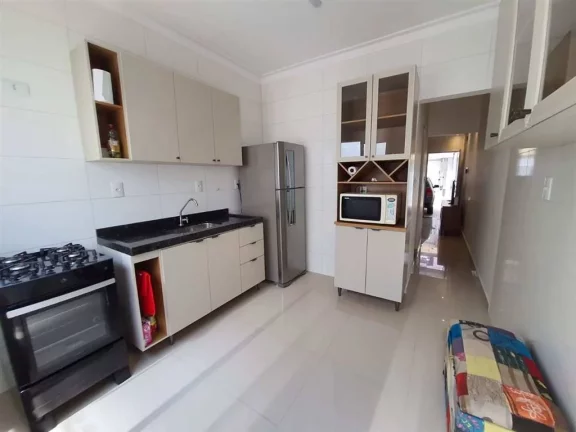 Imagem Casa com 2 dormitórios à venda, 70 m² por R$ 398.000 - Caiçara - Praia Grande/SP