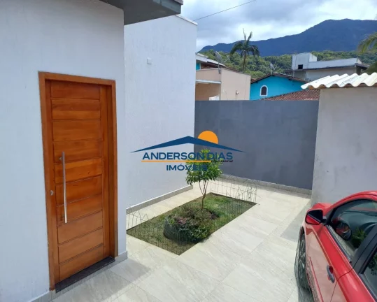 Imagem Casa com 2 dormitórios à venda, 65 m² por R$ 550.000 - Massaguaçu - Caraguatatuba/SP