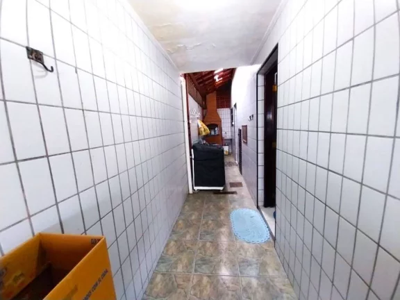 Imagem Sobrado com 2 dormitórios à venda, 95 m² por R$ 360.000,00 - Caiçara - Praia Grande/SP