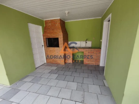 Imagem Casa com 4 quartos há 700 metros da praia no bairro Meia Praia em Navegantes a venda na Adriano Carpes Imóveis vende