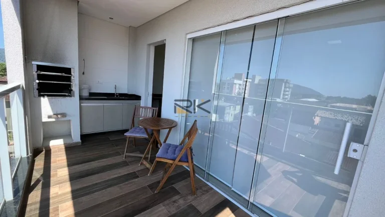 Imagem APARTAMENTO NO CENTRO COM 2 DORMITÓRIOS SENDO 1 SUÍTE, 1 BANHEIRO SOCIAL, VARANGA GOURMET COM CHURRASQUEIRA, 2 VAGAS DE GARAGEM