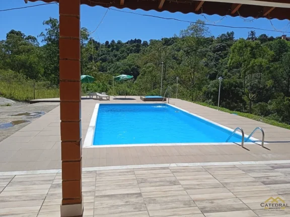 Imagem Chácara à venda com 3 quartos, piscina e área gourmet em Campo Limpo Paulista.