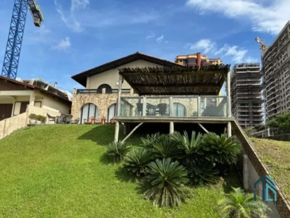Imagem Casa frente Mar duas frentes, com 6 Suítes, 450m2 de área construída em Piçarras SC