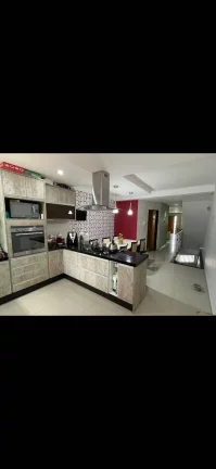 Imagem Sobrado com 250 m² 3 Dormitorios sendo 1 Suíte com sacada e 4 Vagas