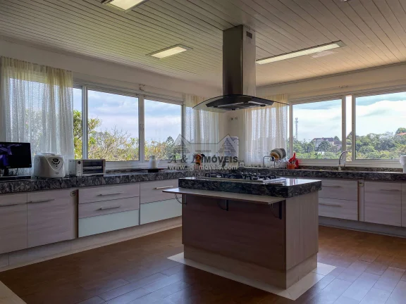 Imagem Casa à venda em Campos do Jordão – Casa com 06 suítes no Alto do Capivari