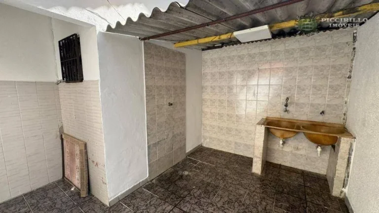 Imagem Casa com 3 dormitórios à venda, 71 m² por R$ 590.000 - Vila Guilhermina - Praia Grande/SP