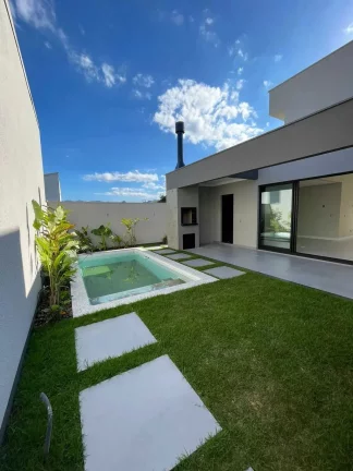 Imagem Casa alto padrão com 3 dormitórios sendo 1 suíte master e 2 vagas de garagem em Palhoça/SC
