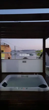 Imagem Casa á 10 metros da praia com Terraço vista Mar, Equipada com 04 dormitórios sendo 01 suíte máster à Venda em Governador Celso Ramos - SC