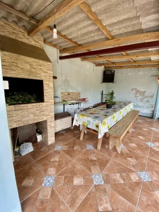 Casa com 3 dormitórios e amplo pátio
