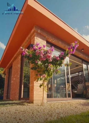 Imagem CASA TÉRREA ESTILO NORMANDO, 4 SUÍTES, TERRENO 1.107m², COND. NA GRANJA
