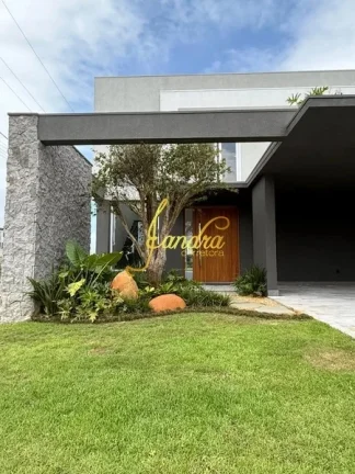 Imagem Sobrado condomínio fechado com 05 suítes e piscina beira lago