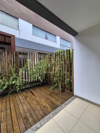 Imagem Village Imbassaí quarto e sala com varanda a 600metros da praia a venda