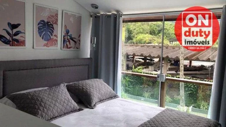 Imagem Sobrado com 3 dormitórios à venda, 150 m² por R$ 1.100.000,00 - Cidade Jardim Tom - Guarujá/SP