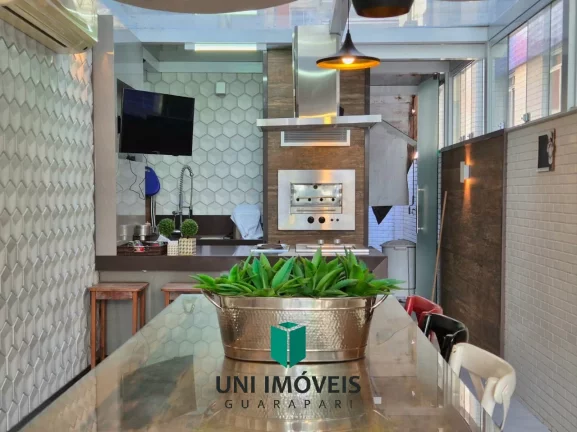 Imagem Apartamento de design elegante no Centro de Guarapari com 3 quartos, suite, área gourmet e 2 vagas de garagem