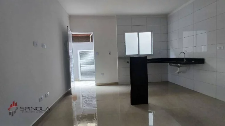 Imagem Casa com 2 dormitórios à venda, 70 m² por R$ 450.000,00 - tude basto - Praia Grande/SP