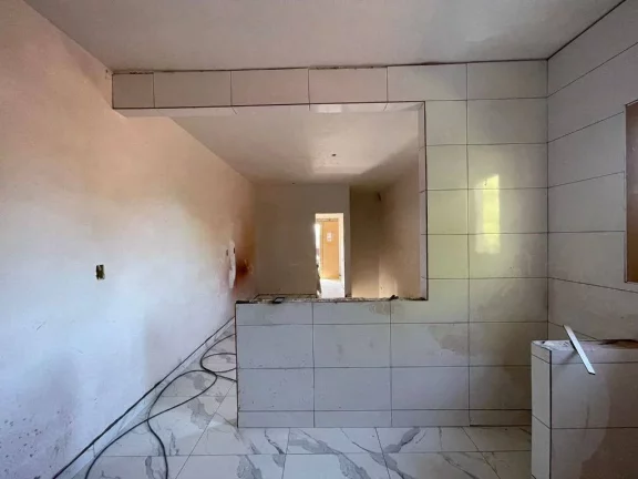 Imagem Casa com 2 dormitórios à venda, 63 m² por R$ 385.000 - Mirim - Praia Grande/SP