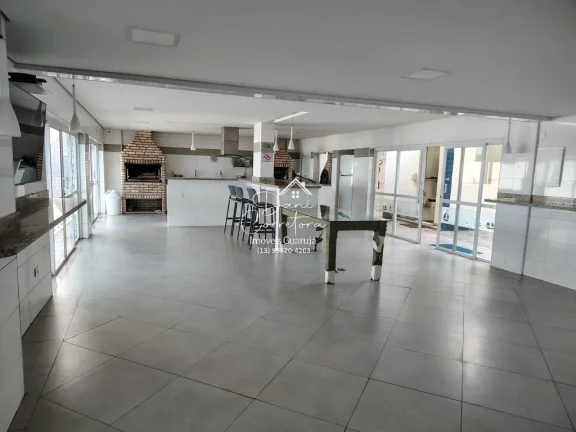 Imagem Apartamento com locação sem garantia frente mar Tombo com lazer: 2 salas, 2 banheiros, 1 vaga de garagem, 78m².