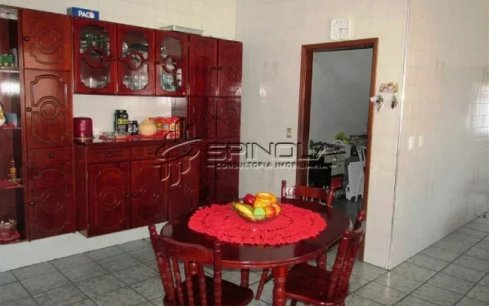 Imagem Casa com 3 dormitórios à venda, 190 m² por R$ 850.000 - Vila Tupi - Praia Grande/SP