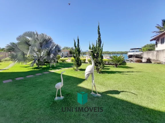 Imagem Mansão de luxo à venda no Canal de Guarapari com marina privativa, 5 suítes e lazer completo