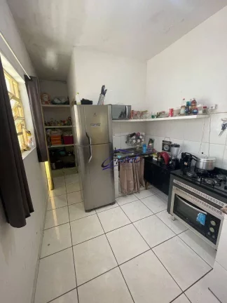 Imagem Casa com 2 dormitórios à venda, 95 m² por R$ 390.000,00 - Caiçara - Praia Grande/SP