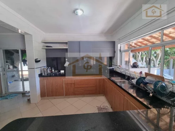 Imagem Casa com 4 dormitórios e piscina em terreno de 940 metros