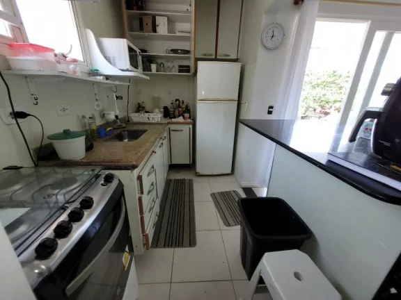 Imagem APARTAMENTO TOTALMENTE REFORMADO A 50 METROS DO MAR, 2 DORMITORIOS, 1 VAGA, TOMBO.