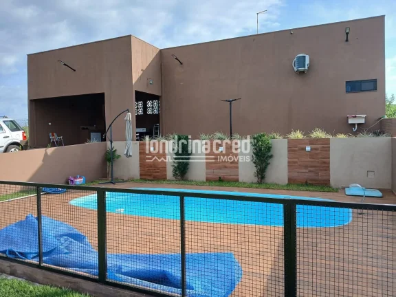 Imagem Chácara à Venda no Condomínio Farol de Paranapanema II – Alvorada do Sul | Porteira Fechada, Mobiliada, Piscina e Grama Esmeralda em Todo o Terreno!