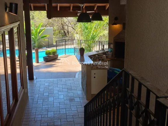 Imagem Encante-se com esta belíssima casa que oferece 4 suítes, incluindo uma suíte master com hidro e d...