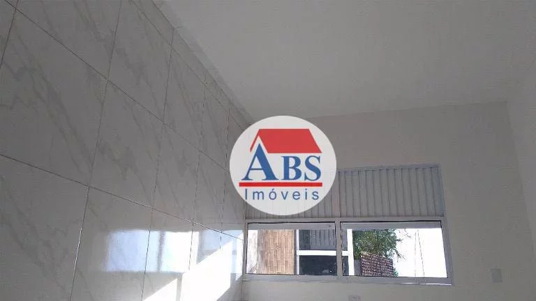 Imagem Casa Sobreposta Alta com Sacada