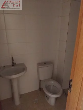 Imagem Apartamento à venda na Guilhermina, Praia Grande-SP: 2 quartos, 1 suíte, 1 vaga de garagem e 56m² de área. Adquira já!