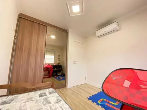 Imagem Apartamento com 3 dormitórios sendo 1 suíte e 2 vagas de garagem em Bombas, Bombinhas/SC