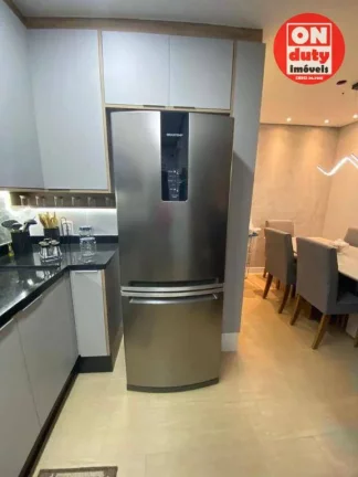Imagem Apartamento com 2 dormitórios à venda, 45 m² por R$ 320.000,00 - Areia Branca - Santos/SP