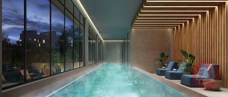 Imagem Luxuoso apartamento com suíte, vagas e infraestrutura.