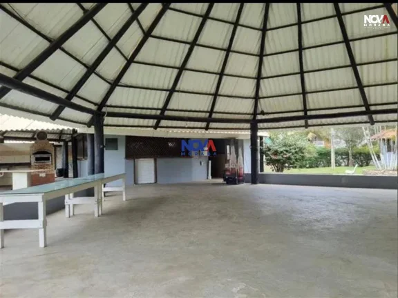 Imagem Conheça esta deslumbrante casa triplex, com 280m de área privativa, localizada no condomínio no R...