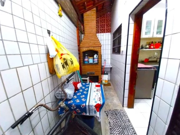 Imagem Sobrado com 2 dormitórios à venda, 95 m² por R$ 360.000,00 - Caiçara - Praia Grande/SP