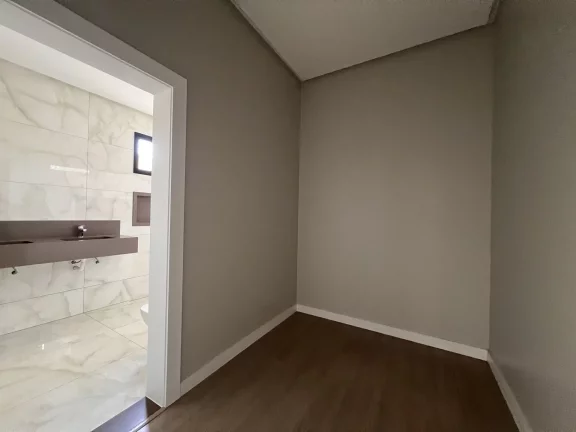 Imagem Casa Alto Padrão à Venda no Alto dos Caiçaras – 3 Suítes, Piscina e Área Gourmet em Patos de Minas