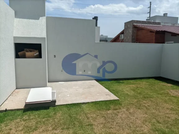 Imagem Casa geminada com 3 dormitórios no Loteamento Morada das Palmeiras em Torres/RS