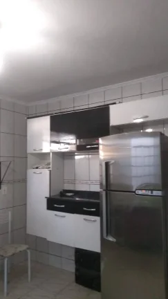 Imagem Casa Terrea com quintal 99 metros 2 Dormitorios e 2 Vagas de Garagens