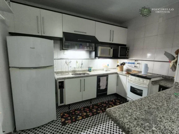 Imagem Casa com 2 dormitórios à venda, 115 m² por R$ 550.000,00 - Vila Guilhermina - Praia Grande/SP